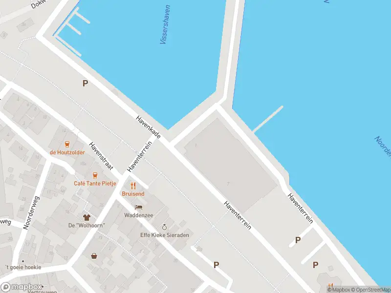 Ambulance met gepaste spoed naar de Havenkade in Den Oever