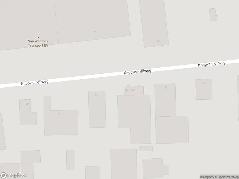 Ambulance, brandweer en politie met grote spoed naar de Koopvaardijweg in Oosterhout vanwege gebouwbrand