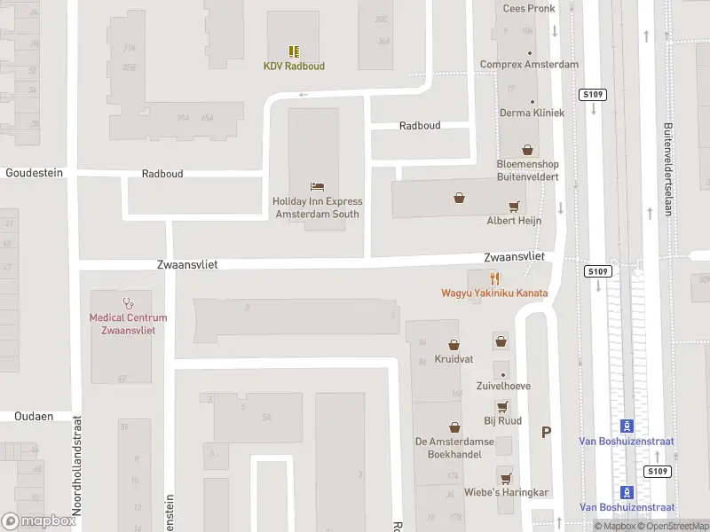 Ambulance met grote spoed naar de Zwaansvliet in Amsterdam