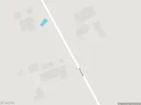 Brandweer met gepaste spoed naar de Kooiweg in Giethoorn vanwege stormschade