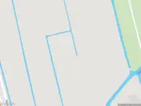 Ambulance met grote spoed naar de Rijksstraatweg in Delft