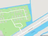 Ambulance met grote spoed naar de Tweemanspolder in Zevenhuizen