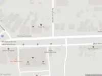 Brandweer met gepaste spoed naar de Sluiskade in Hoogezand