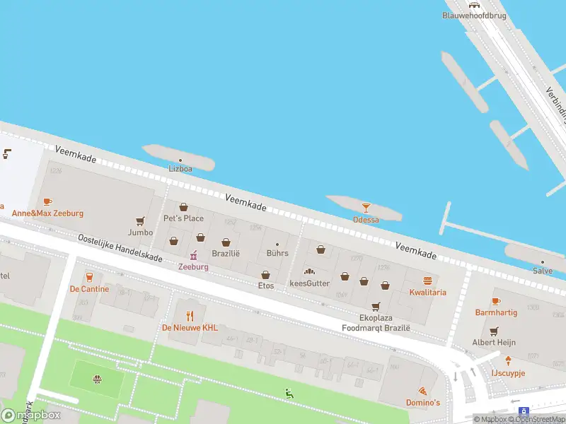 Ambulance met gepaste spoed naar de Veemkade in Amsterdam