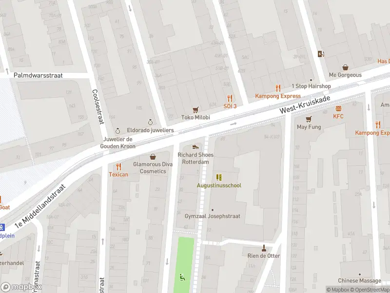 Ambulance met grote spoed naar de West-Kruiskade in Rotterdam