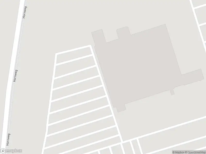 Ambulance met grote spoed naar de Westhavenweg in Amsterdam