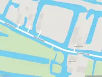 Ambulance met gepaste spoed naar de Gravekoopsedijk in Reeuwijk