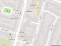 Ambulance met grote spoed naar de Raadhuisstraat in Haarlem