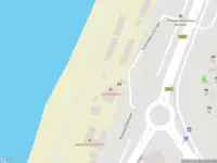 Ambulance met gepaste spoed naar de Strandafgang Barnaart in Zandvoort
