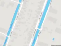 Politie met grote spoed naar de Raadhuisstraat in Wildervank vanwege voertuigen te water