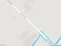 Ambulance met gepaste spoed naar de Grote Zomerdijk in Spanbroek