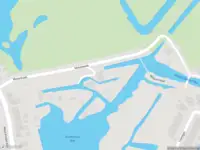 Ambulance met gepaste spoed naar de Molenkade in Alblasserdam