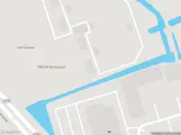 Brandweer met gepaste spoed naar de Verlengde Stellingweg in Oostzaan vanwege een buitenbrand