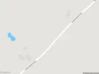 Brandweer met gepaste spoed naar de Oosterpaauwenweg in Overschild vanwege een buitenbrand