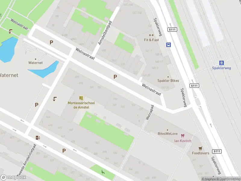 Ambulance met gepaste spoed naar de Welnastraat in Amsterdam