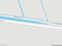 Brandweer met gepaste spoed naar de Verlengde Herendijk in Nieuw-Amsterdam vanwege een buitenbrand