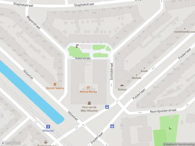 Ambulance met grote spoed naar de Kokerstraat in Rotterdam