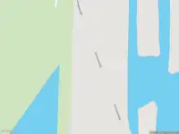 Brandweer met gepaste spoed naar de Munnikenlandse Waalkade in Brakel