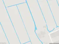 Politie met grote spoed naar de Oostveenseweg in Schipluiden vanwege personen te water