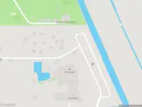 Ambulance met gepaste spoed naar de Basisweg in Weesp