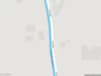 Ambulance met grote spoed naar de Smidsdijk in Cothen