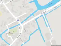 Politie met grote spoed naar de Stationswei in Molkwerum vanwege personen te water