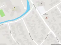 Brandweer met gepaste spoed naar de Kerkstraat in Harreveld vanwege stormschade