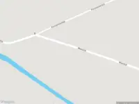 Brandweer met gepaste spoed naar de Weeldijk in 's-Gravenpolder vanwege een buitenbrand