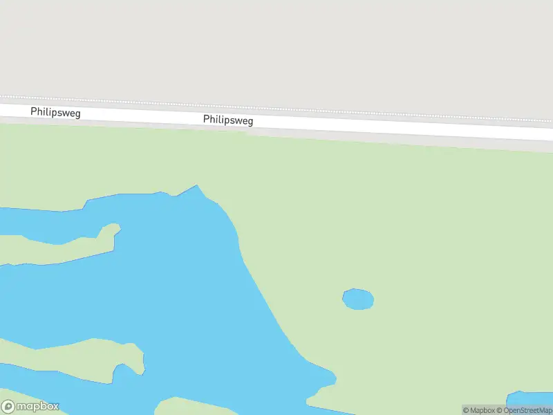 Brandweer en politie met grote spoed naar de Philipsweg in Oostburg vanwege voertuigen te water