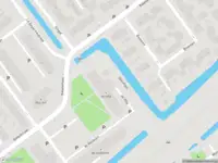 Ambulance met grote spoed naar de De Wilg in Nieuwerkerk aan den IJssel