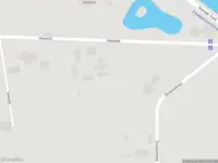 Brandweer met gepaste spoed naar de Strooiselweg in Lieren vanwege stormschade