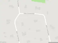 Brandweer met gepaste spoed naar de Dr. L E van Hoornlaan in Garderen vanwege stormschade