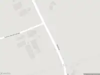 Brandweer met gepaste spoed naar de Heistraat in Hoeven vanwege een buitenbrand