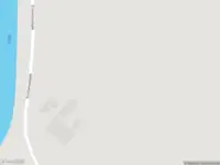 Brandweer met grote spoed naar de Erichemsekade in Erichem vanwege voertuigen te water