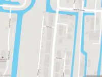 Ambulance met grote spoed naar de Berkenweg in Boskoop