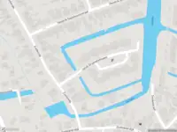 Ambulance met grote spoed naar de Jacob Groenplantsoen in Amsterdam