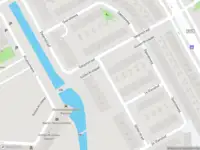 Ambulance met grote spoed naar de Glitterstraat in Amsterdam