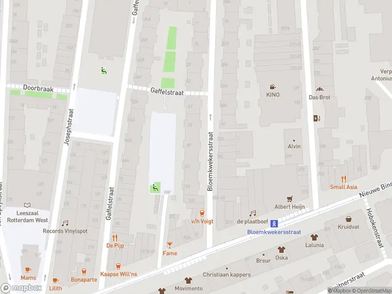 Ambulance met gepaste spoed naar de Bloemkwekersstraat in Rotterdam