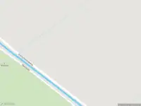 Brandweer met gepaste spoed naar de Overscheenseweg in Naarden vanwege stormschade