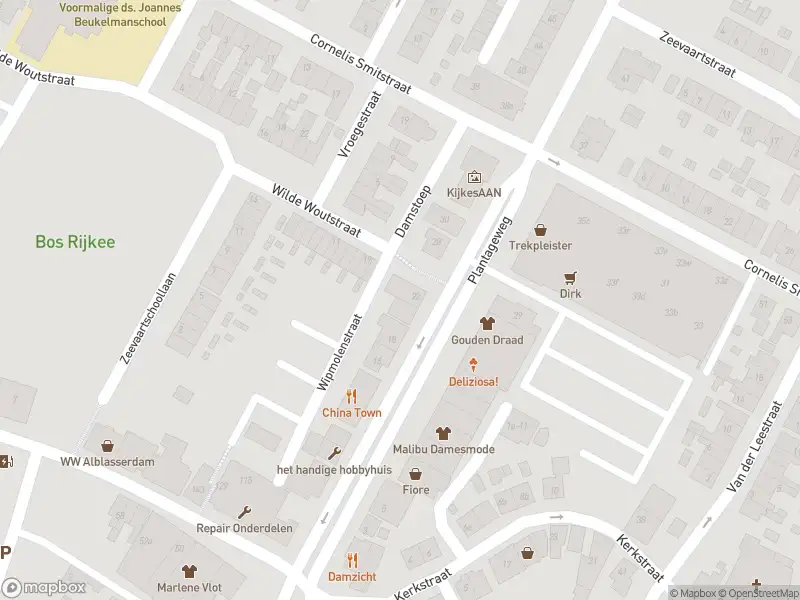 Ambulance met grote spoed naar de Dam in Alblasserdam vanwege gebouwbrand