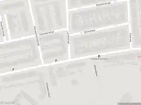 Brandweer met gepaste spoed naar de Lariksstraat in Breda