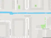 Ambulance met gepaste spoed naar de Westbroekplein in Amsterdam