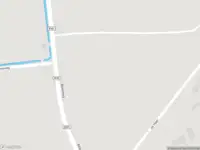 Politie naar de Balkerweg in Witharen vanwege voertuigen te water