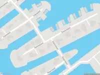 Brandweer met grote spoed naar de Zwaneneiland in Meerstad vanwege gebouwbrand