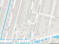 Ambulance met grote spoed naar de 's-Gravenweg in Rotterdam