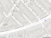 Ambulance met grote spoed naar de Veenlantstraat in Schiedam