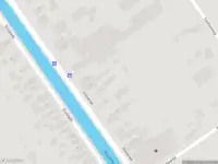 Brandweer met grote spoed naar de Sluiskade in Musselkanaal vanwege gebouwbrand