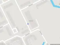 Ambulance met grote spoed naar de Nudenoord in Rotterdam