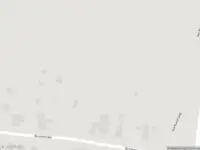 Brandweer met gepaste spoed naar de Waalbandijk in Tiel vanwege een buitenbrand