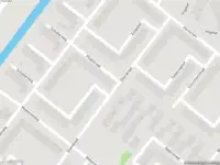 Ambulance met grote spoed naar de Plutostraat in Amsterdam